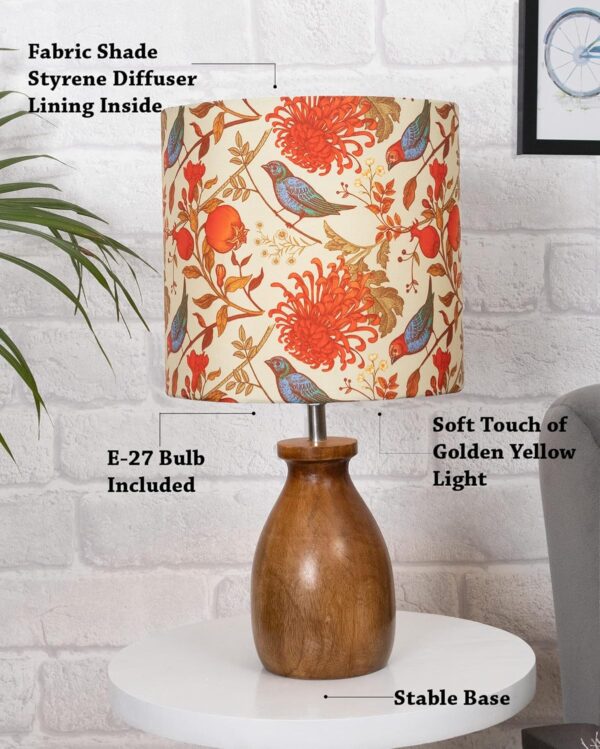 Front view of Homesake wooden table lamp with bird design and wooden base