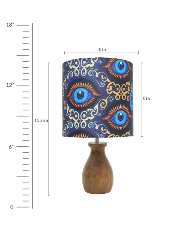 Side angle of modern table lamp showing detailed wooden base and fabric shade